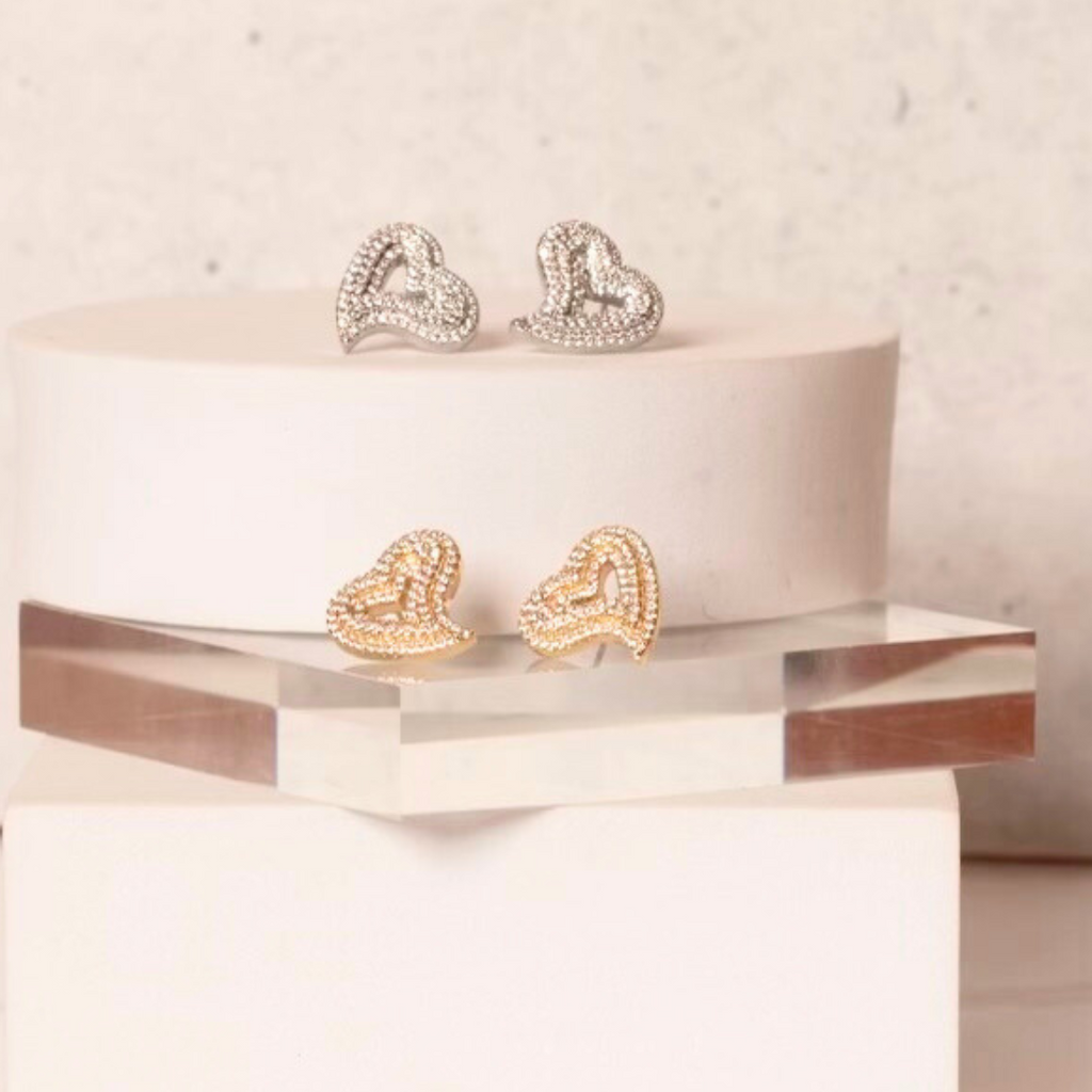curved heart miniature stud earrings silver and gold